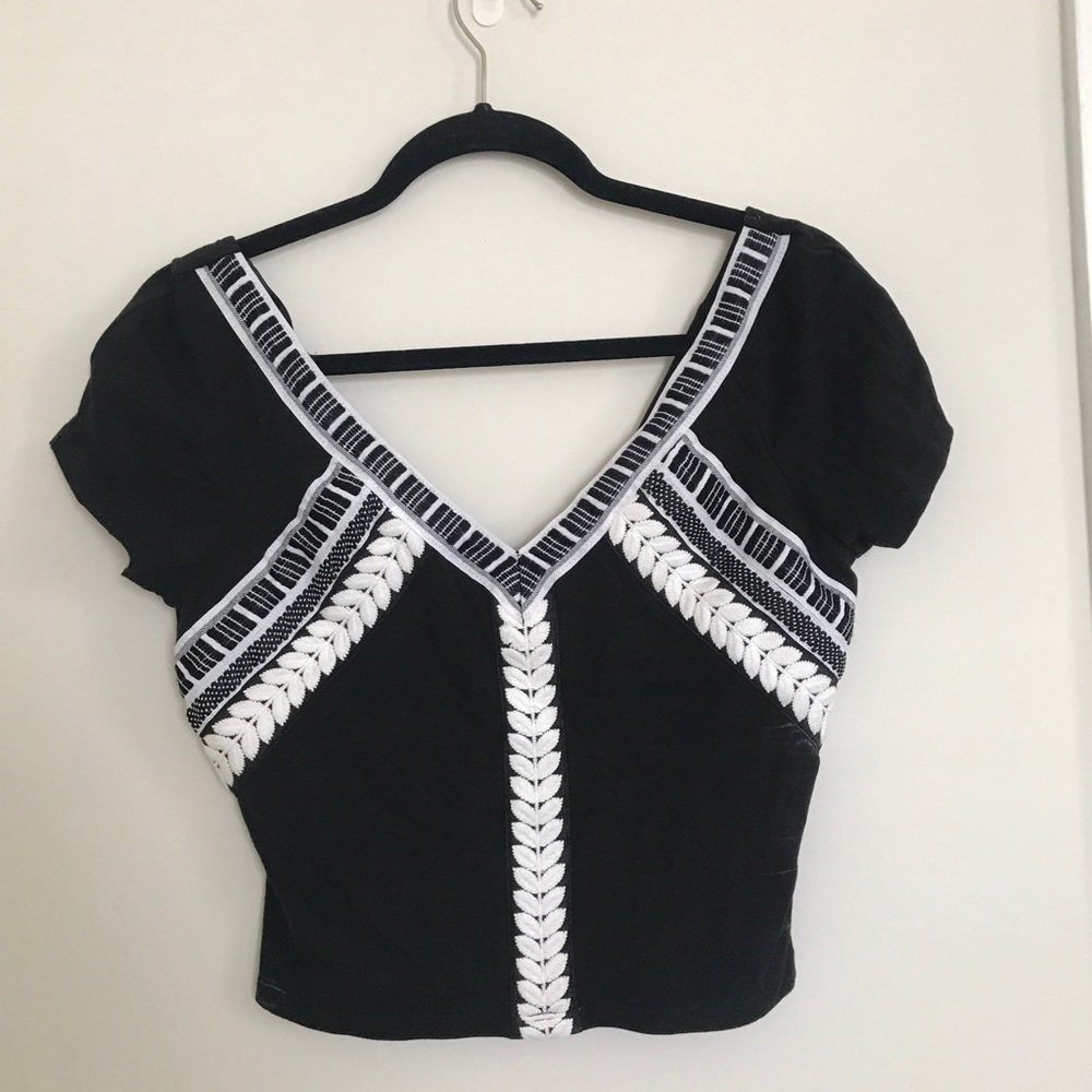 Black v-neck crop top w/ white stitching
